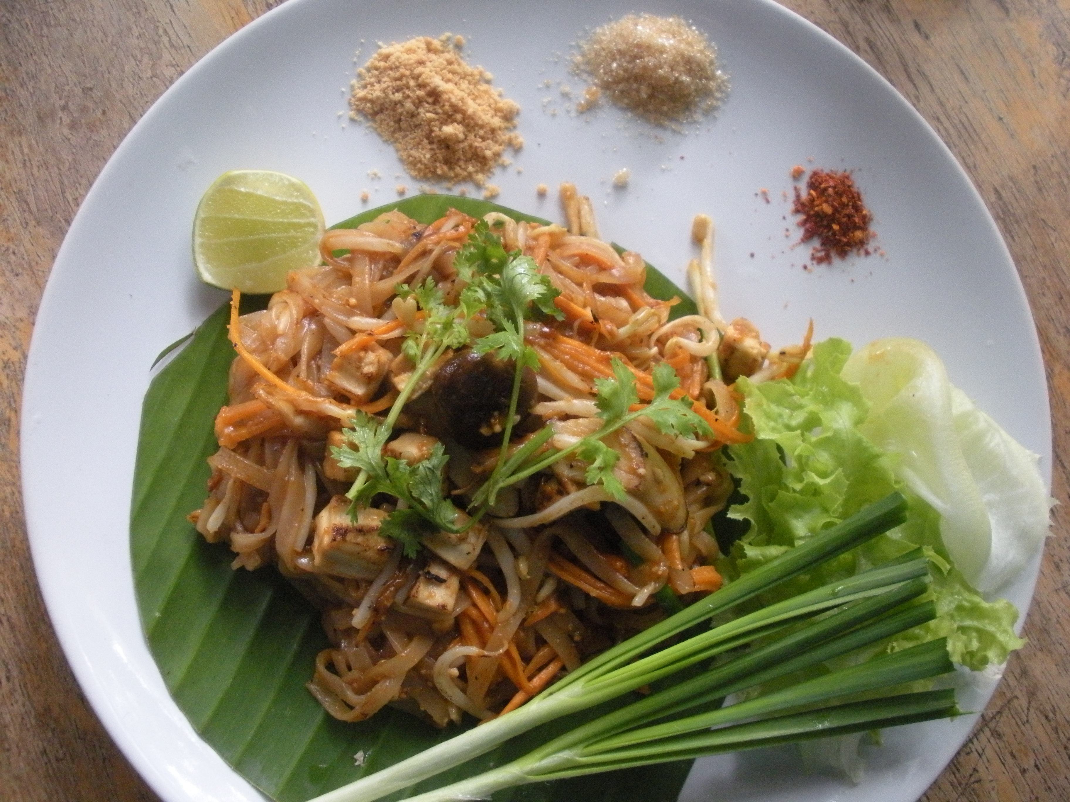 a plate of delicious pad thai, so inexpensive and so good, from a great restaurant at the back of a magnificent temple!